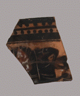 Photograph of a black-figure potsherd, as described in the text.