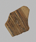 Photography of a fragmentary ceramic potsherd, as described in the text.